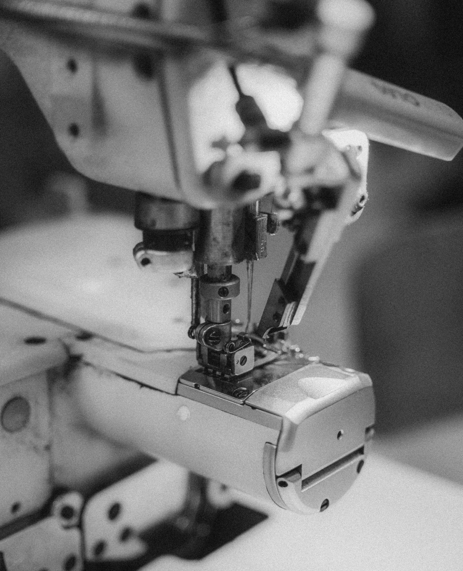 Industrial sewing machine in black and white