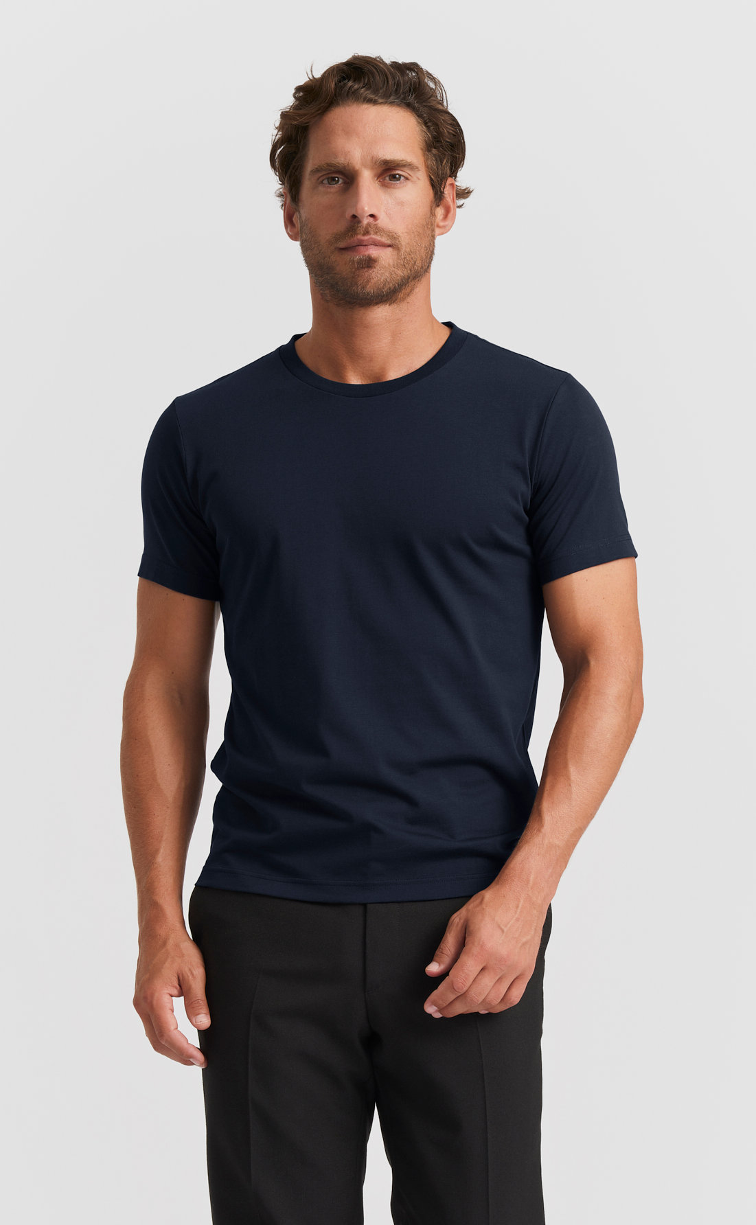 Model wearing deep blue cotton t-shirt image
