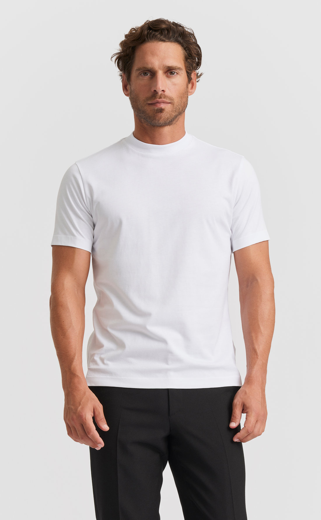 Model wearing white Hi-Neck t-shirt image