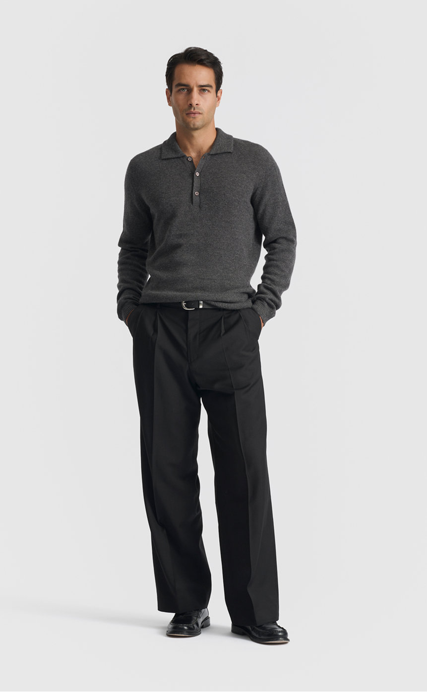 Model wearing our cashmere polo shirt in anthracite