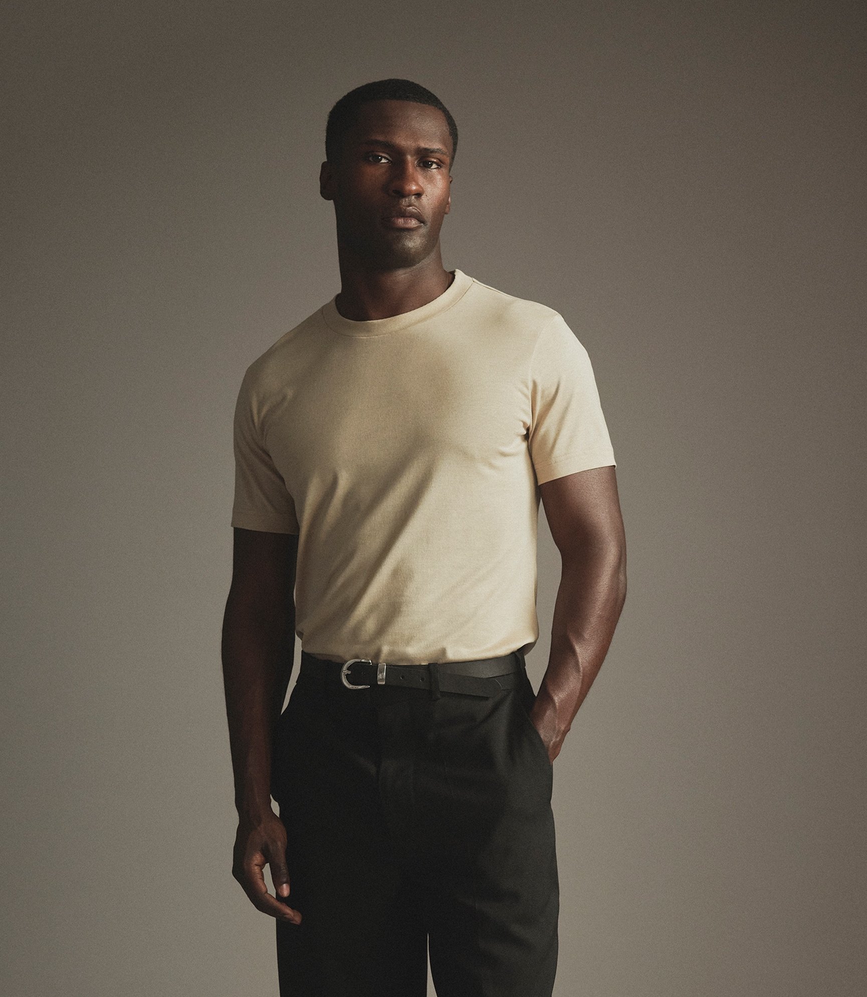 Model wearing our cotton t-shirt in green haze