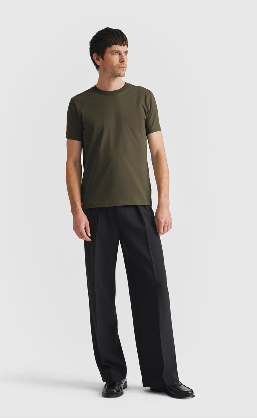 Model wearing cotton t-shirt / grape leaf