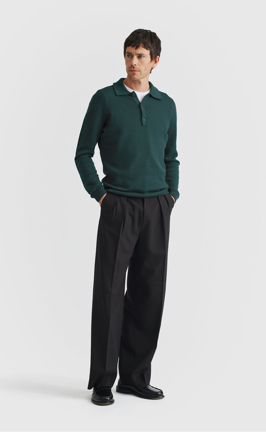 Model wearing our cashmere polo shirt in malachite