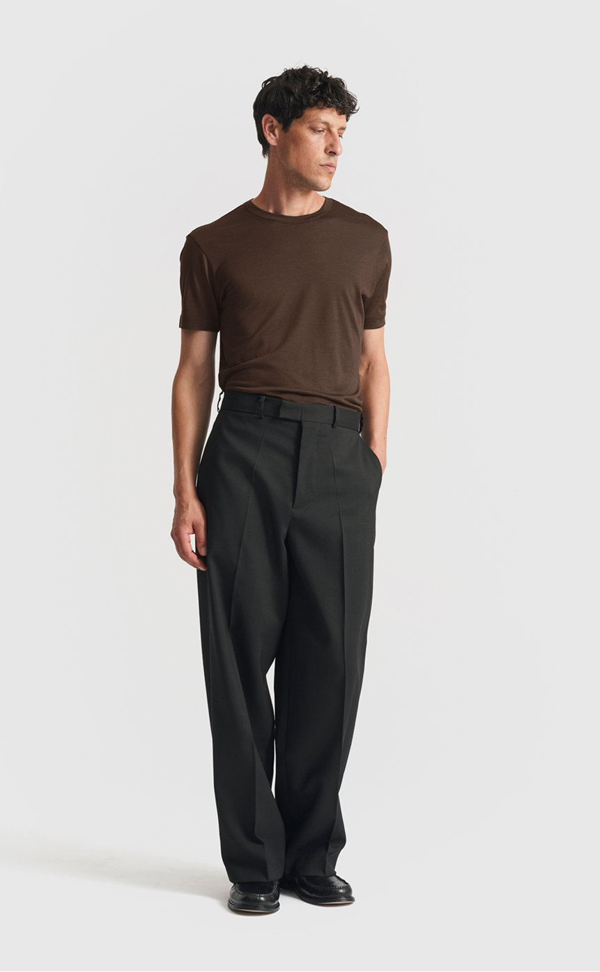 Model wearing our wool t-shirt in black olive