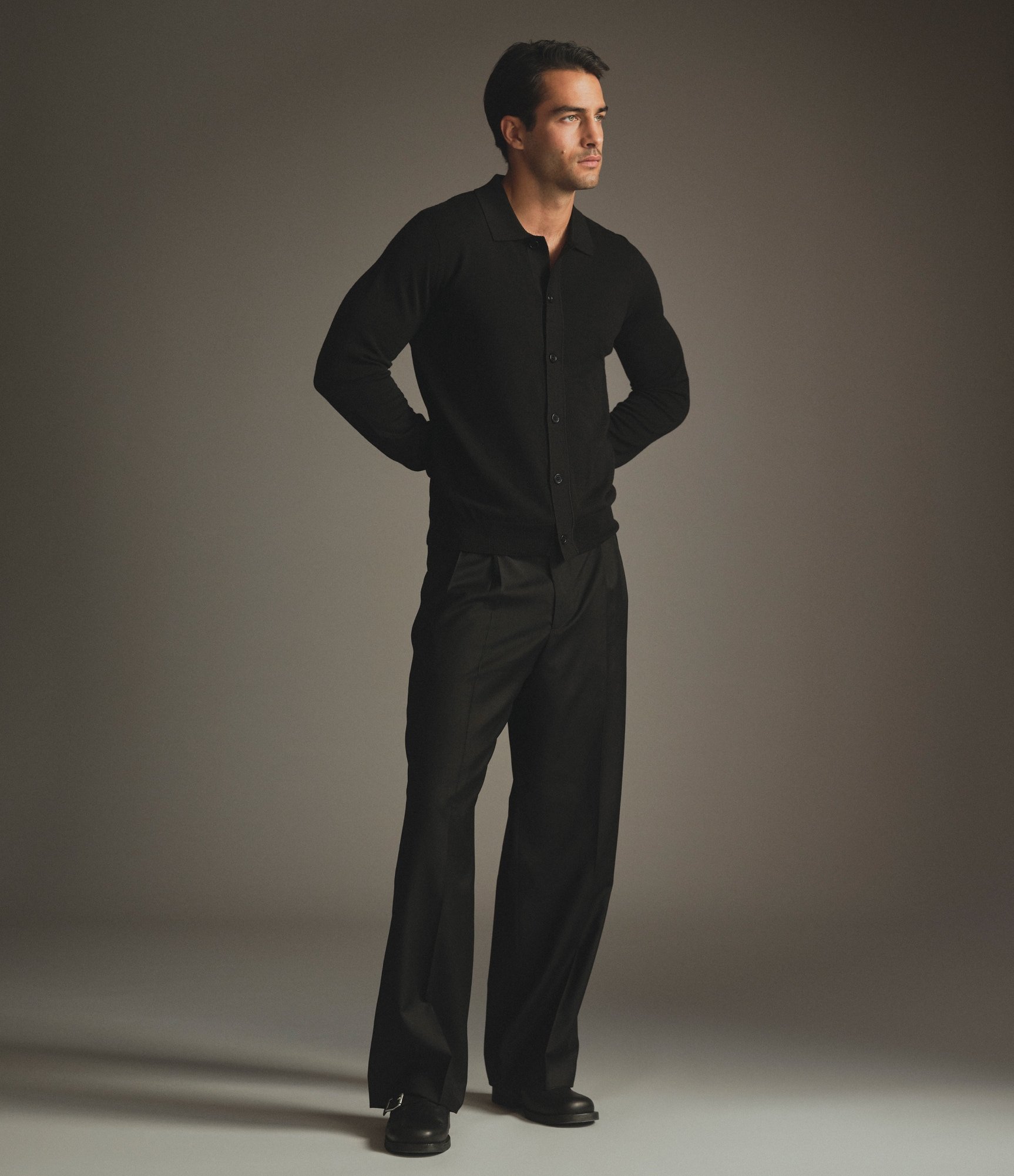 Model wearing our knit shirt in black