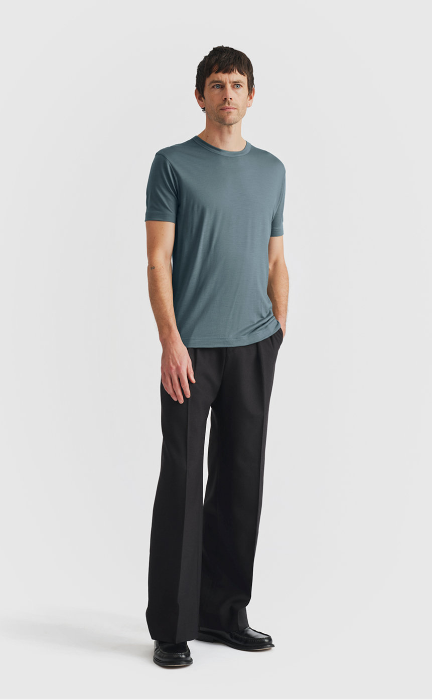 Model wearing our wool t-shirt in stormy weather
