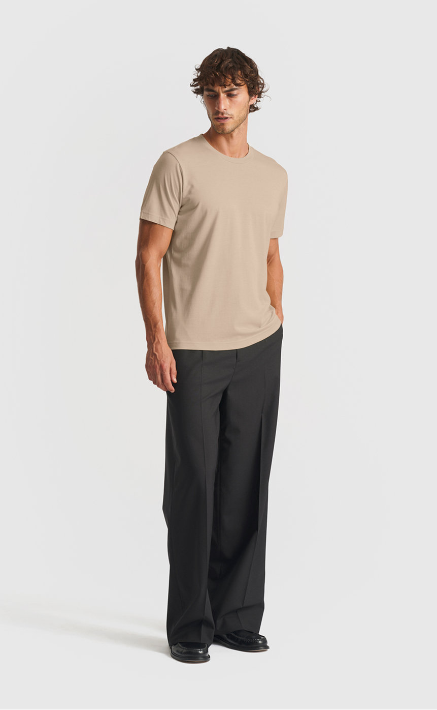 Model wearing our lyocell t-shirt in plaza taupe