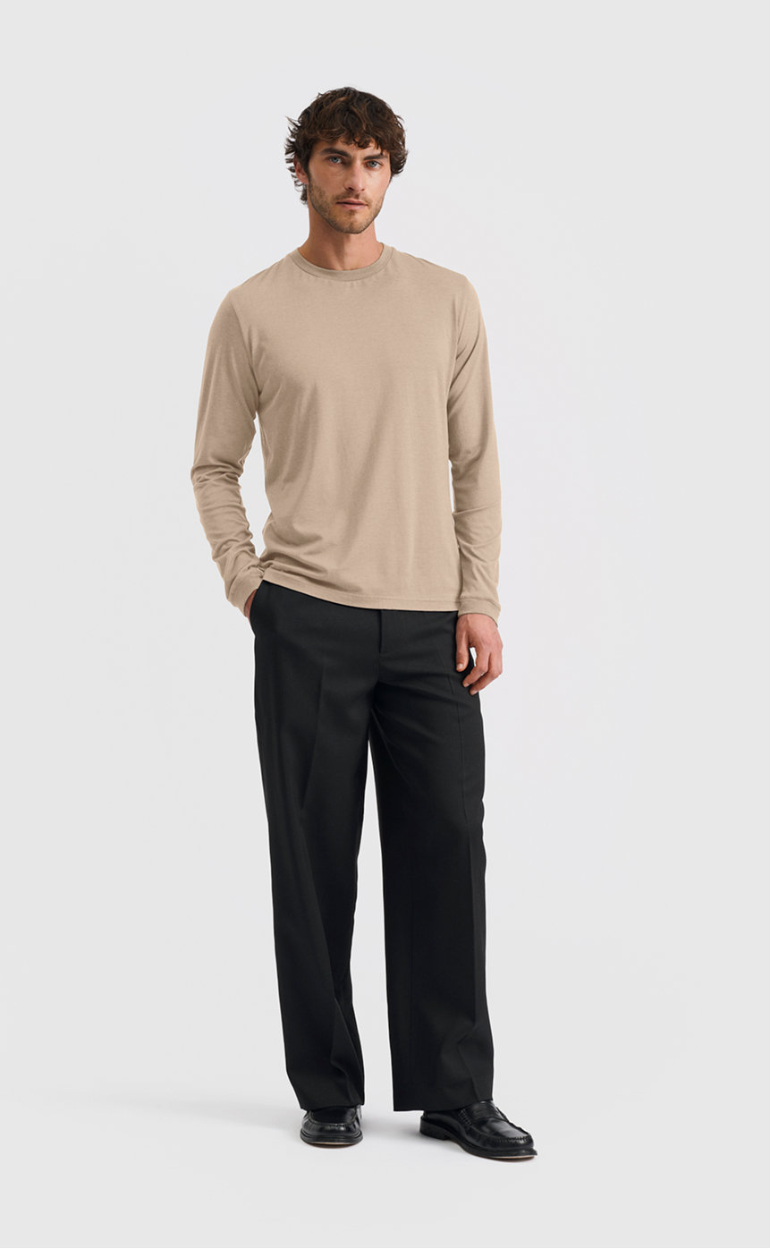 Model wearing our lyocell long sleeve t-shirt in plaza taupe