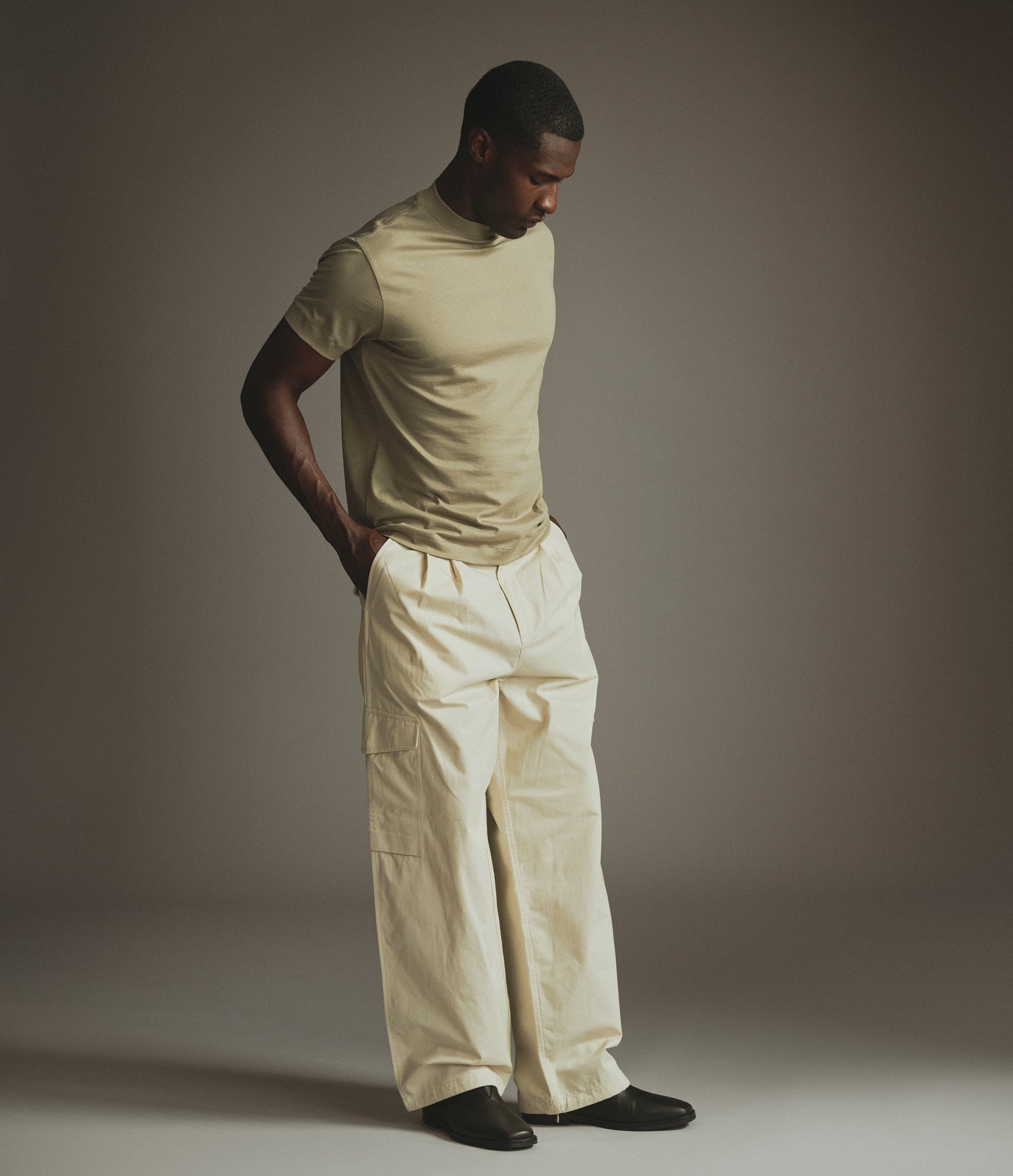 Model wearing our Silk Hi-Neck T-Shirt in Dried Sage