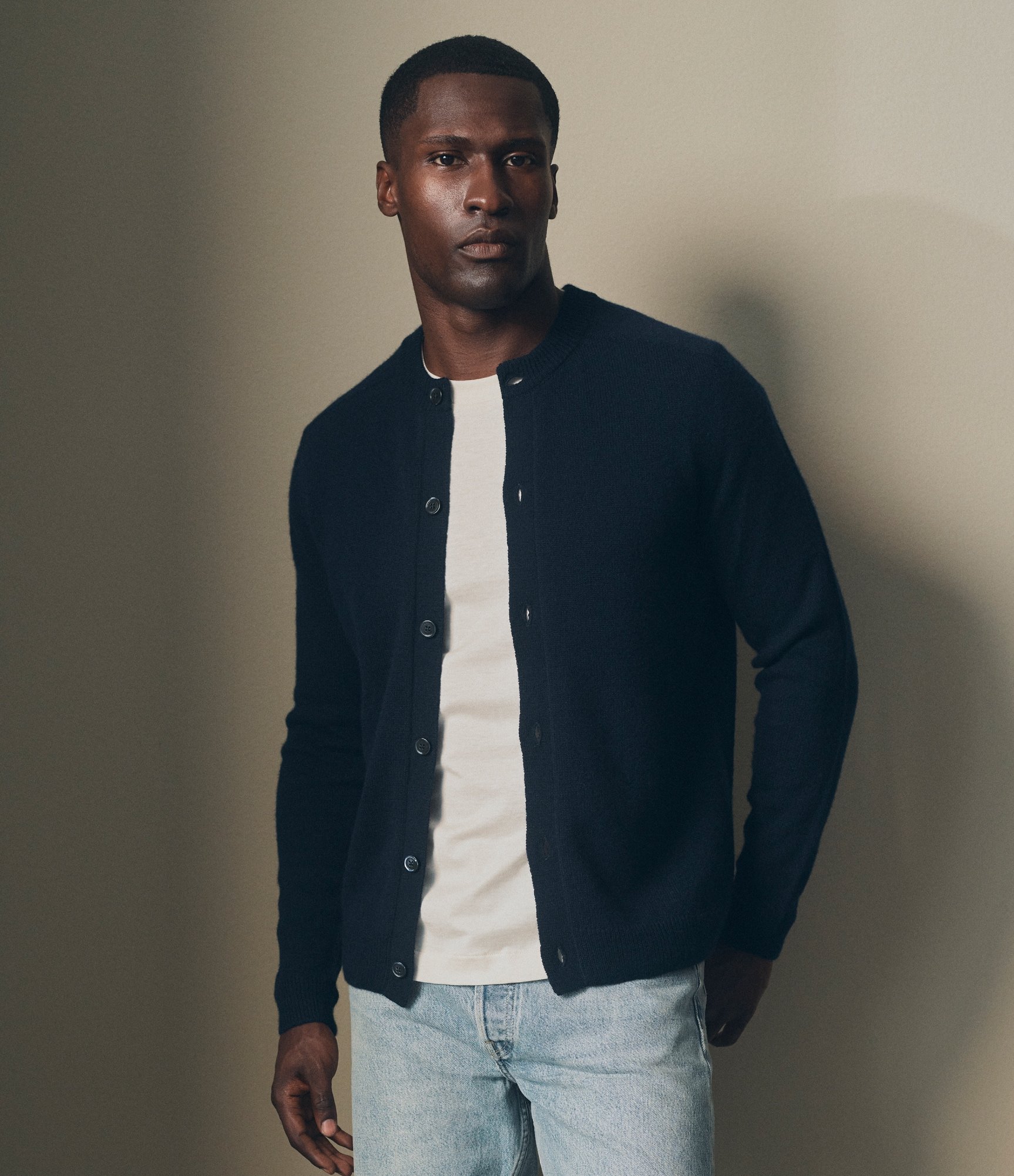 Model wearing our Cashmere Button Up Sweater in Navy